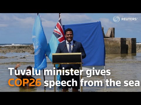 Tuvalu minister gives COP26 speech from the sea