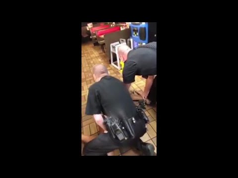 Police officers throw woman to floor during Waffle House arrest
